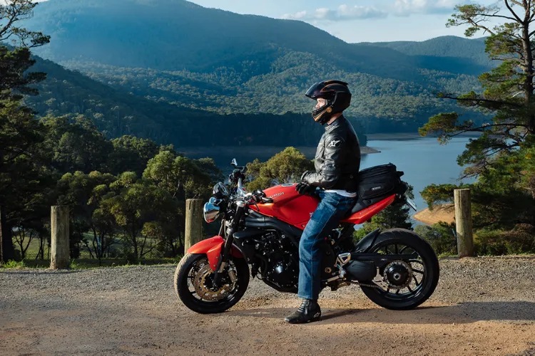 Rider sitting on bike with beautiful view