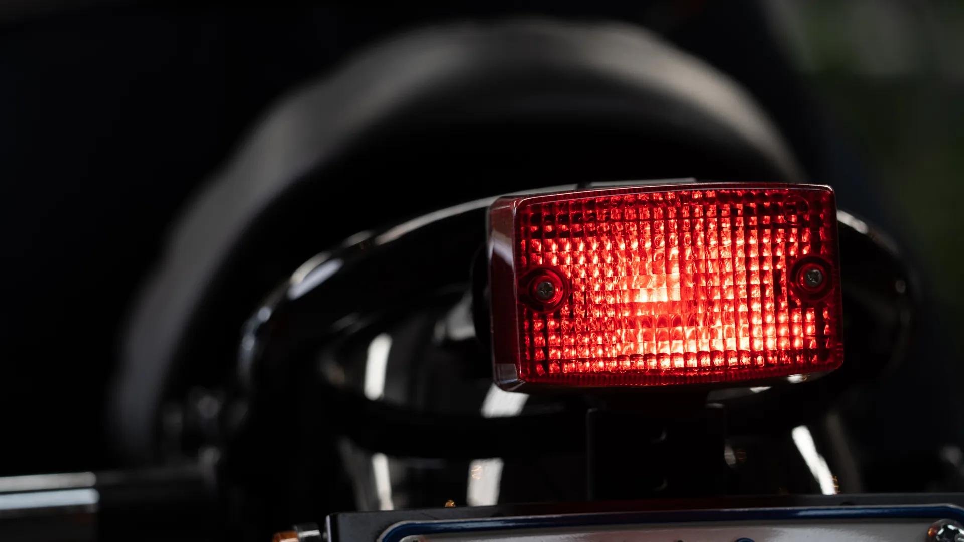 Close-up of a motorcycle's back light